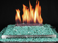 ventless gas fireplace with highly reflective colored glass fire.