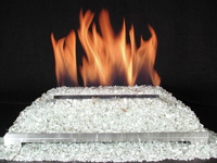 white fire glass on unvented gas fireplace burner stainless steel